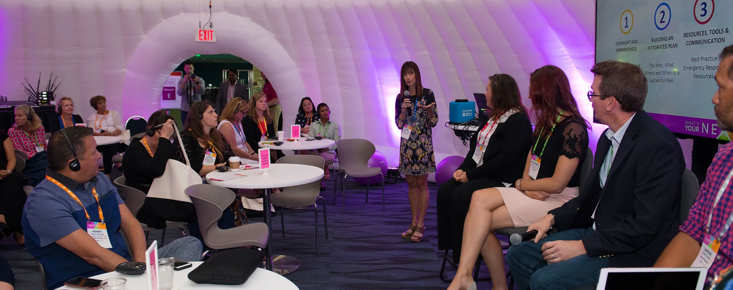Pic showing a Created By Air Panoramic inflatable event structure being used as a presentation area at the Cultivate event