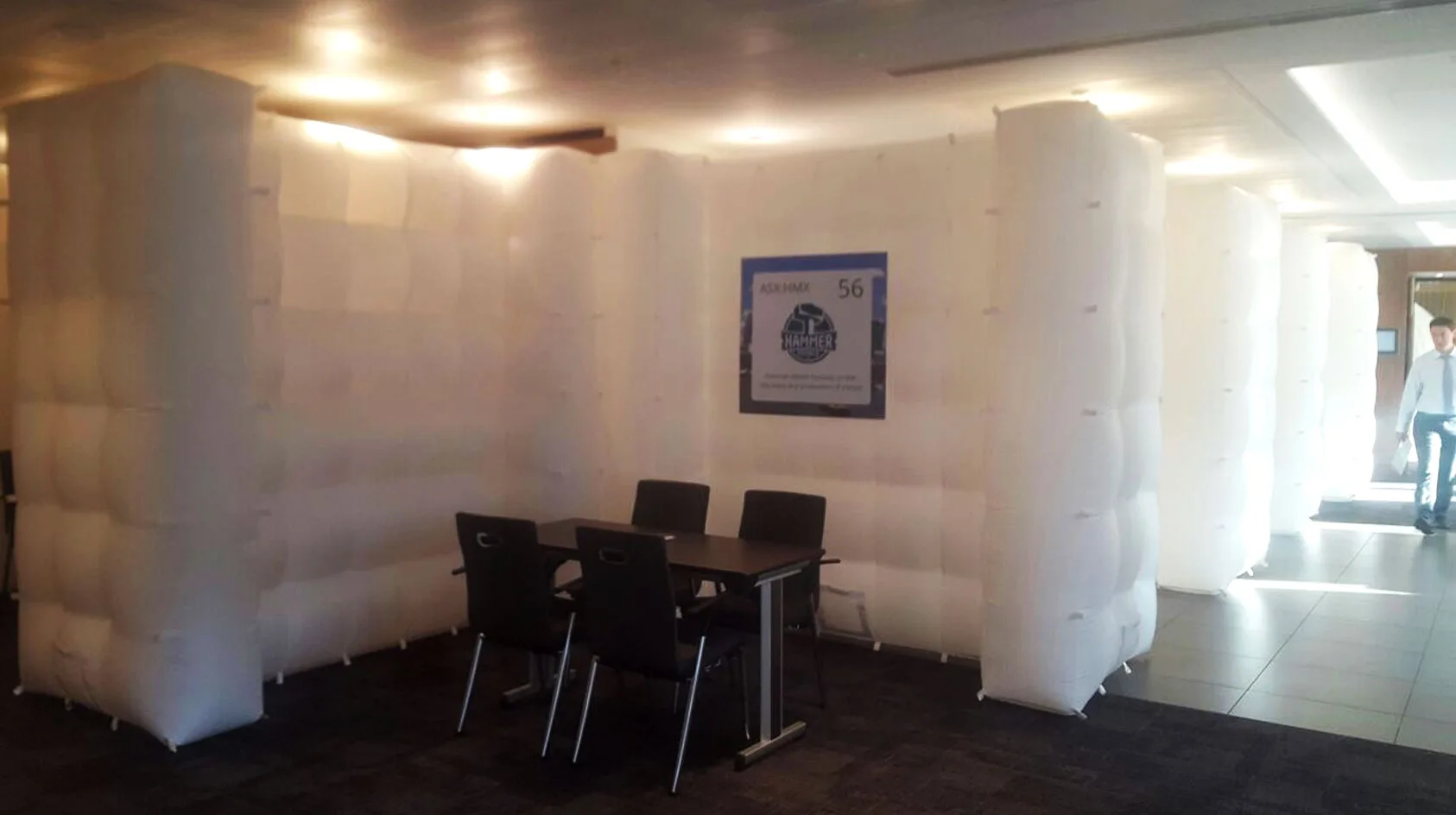 Pic showing four Created By Air Crosswalls used as inflatable dividers in an office
