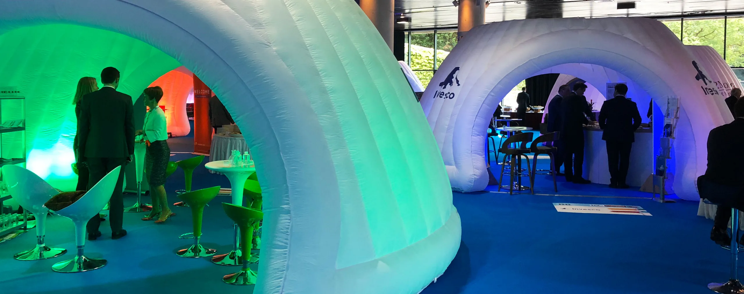 Pic showing two Created By Air modular inflatable Panoramic structures. Each with separate zone colour lighting