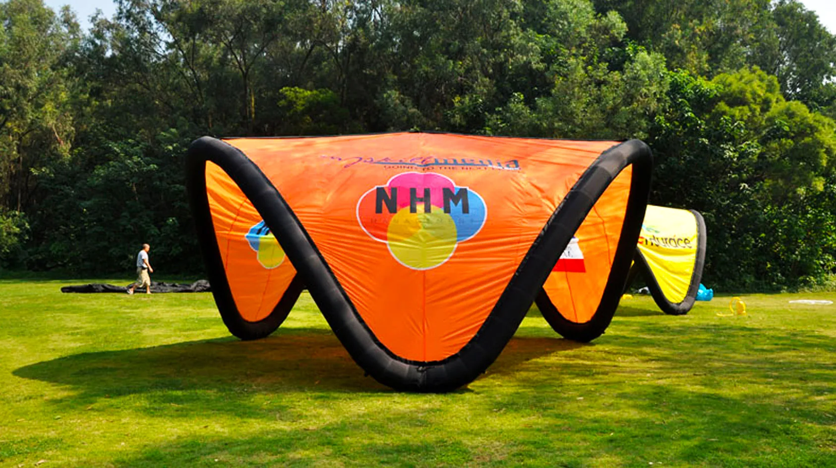 Pic showing a fully branded Created By Air N tent custom branded structure with all sides fully printed