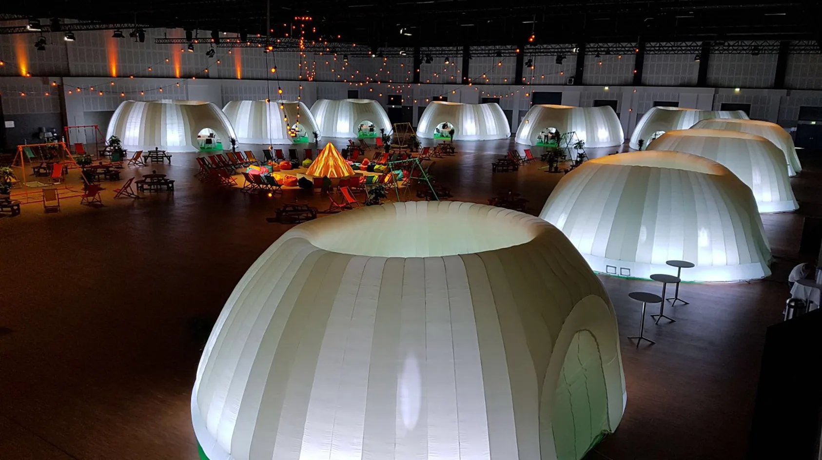 Pic showing the Created By Air Panoramic inflatable event structures set up in the main hall at the Berlin event