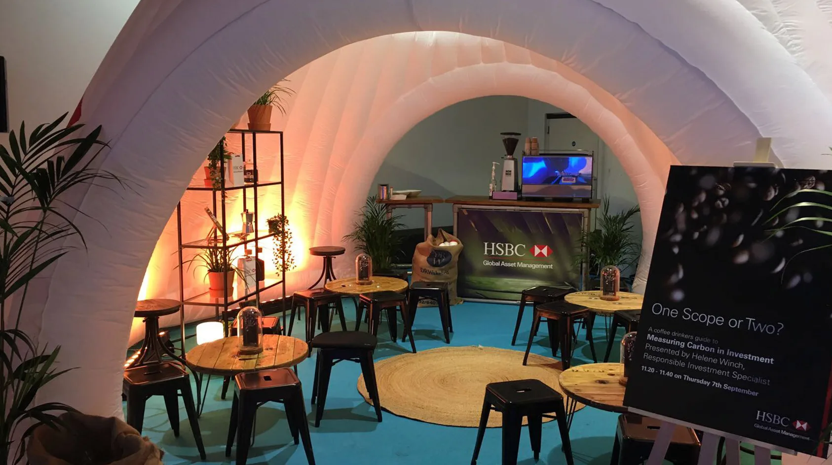Pic showing the interior of a Created By Air inflatable promotion structure setup at an indoor event in Wales