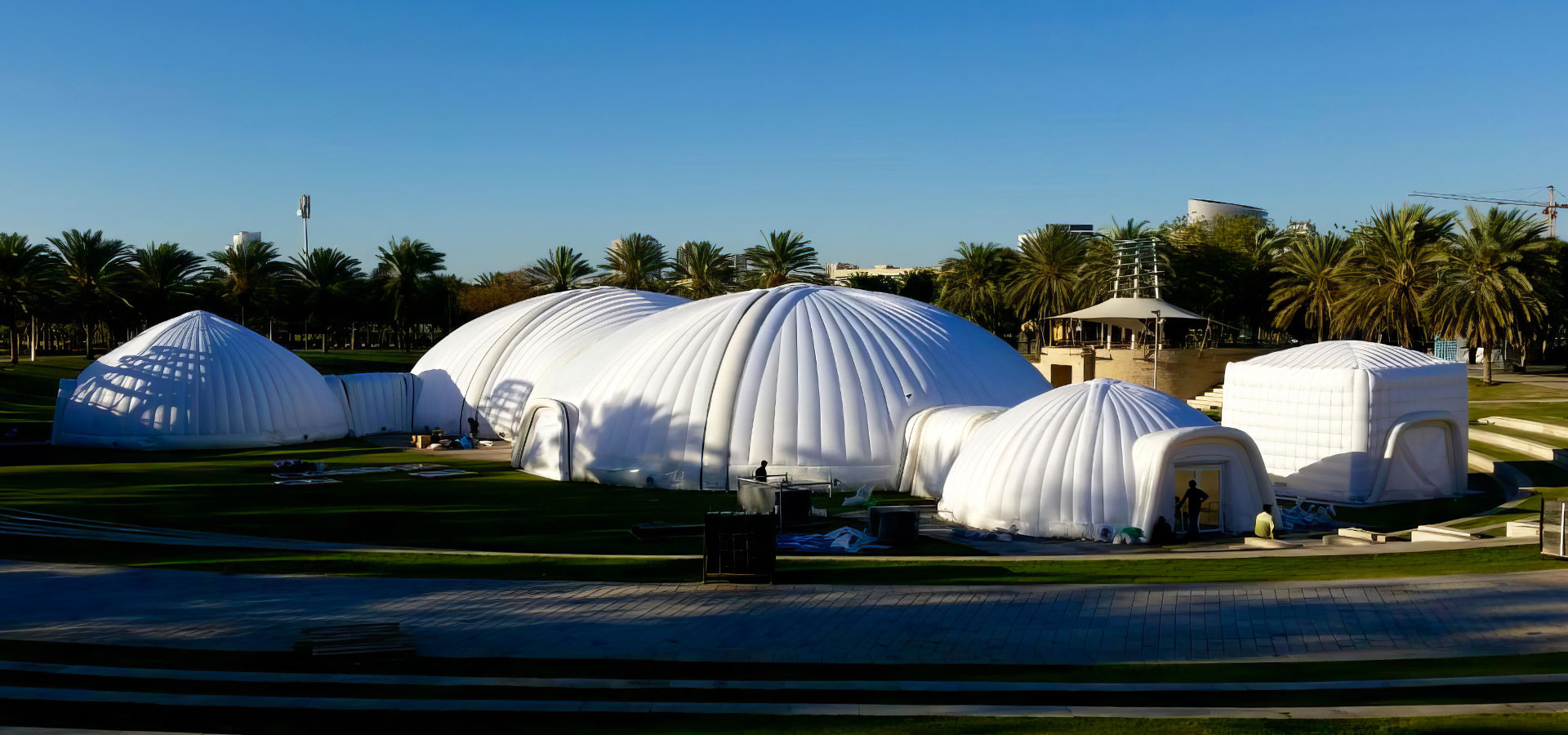 Pic showing a configuration of different shaped and sized Created By Air inflatable structures connected together at an event in Dubai shown during the day